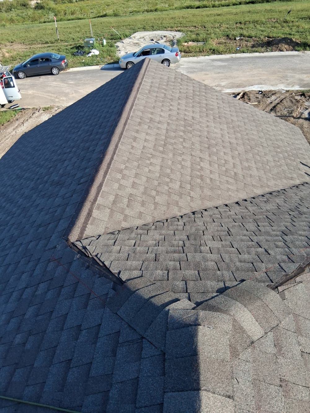Aerial view of a replaced hip roof on a Kansas City area home