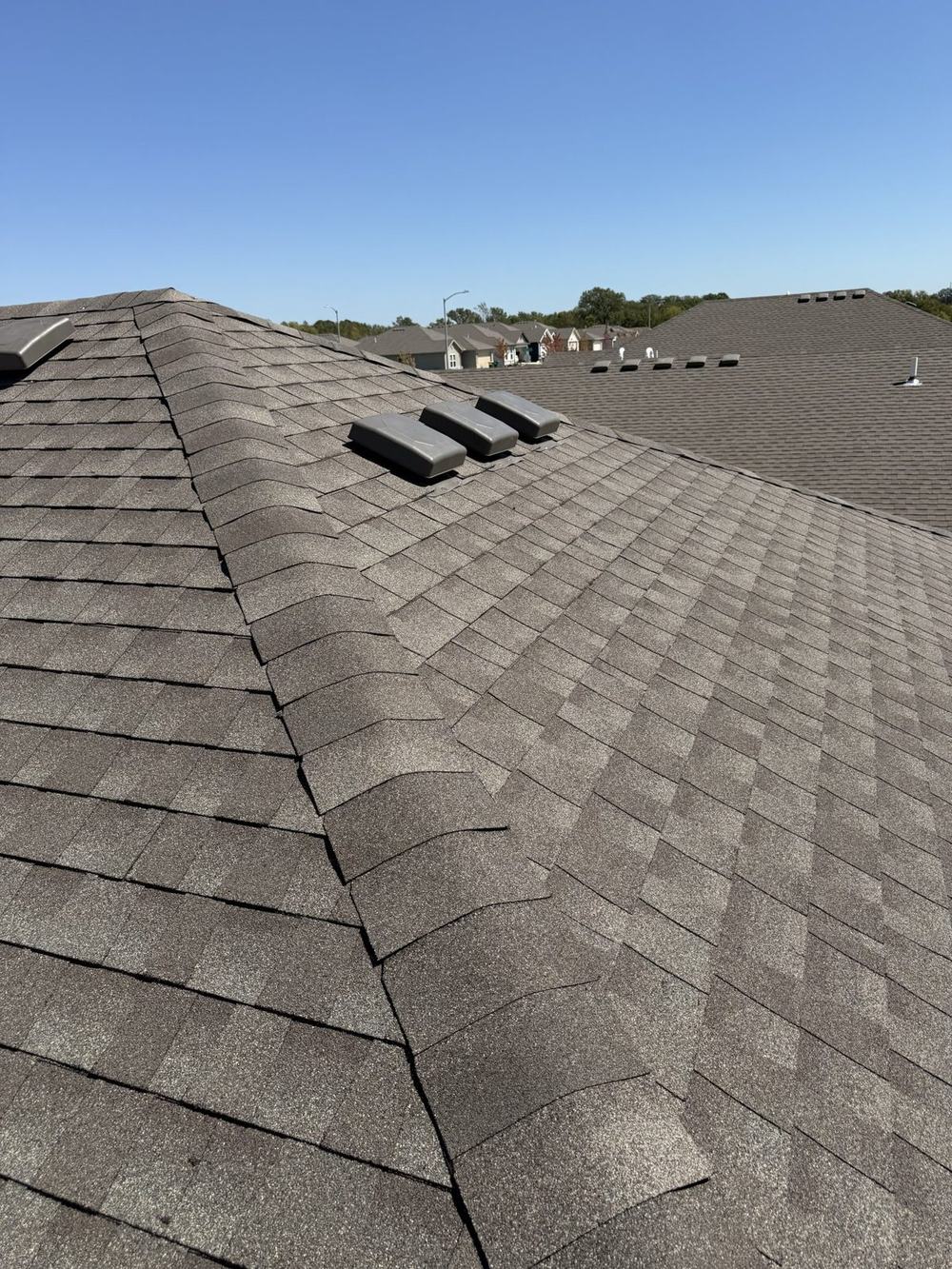 Completed residential roof replacement by JJL Construction